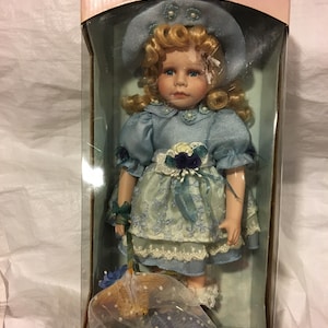 Tuss inc best sale porcelain doll 7278