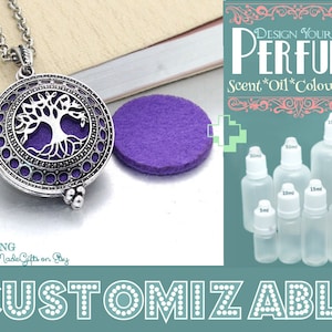 May include: Silver necklace with a tree of life pendant and a purple felt pad. The pendant has a small opening for adding essential oils. The image also shows a set of clear glass bottles with different sizes, labelled with millilitre measurements. The text on the image reads "Design Your Own Perfume Scent*Oil*Colour*Size".