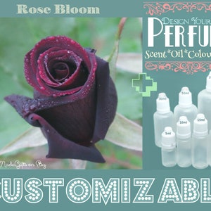 May include: A single dark red rose with water droplets on the petals. The rose is in bloom and is surrounded by green leaves. The image also includes a text overlay that says "Design Your Own Perfume" and shows different sizes of perfume bottles.