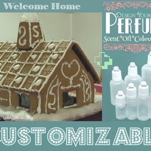 May include: A gingerbread house decorated with white icing and silver sprinkles. The house has a chimney with the number 25 on it. The text "Welcome Home" is at the top of the image. The image also shows a variety of clear glass bottles with different sizes, labeled with milliliter measurements. The text "DESIGN YOUR OWN PERFUME" is at the top of the image. The text "Scent*Oil*Colour*Size" is below the text "DESIGN YOUR OWN PERFUME". The text "CUSTOMIZABLE" is at the bottom of the image.