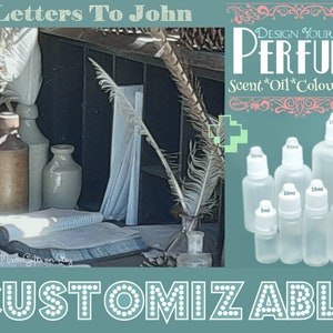 May include: A customizable perfume bottle with a variety of sizes available. The bottles are clear glass with white caps. The image also includes a quill pen and inkwell, suggesting a personalized gift.