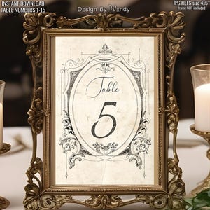 May include: A printable table number card with an ornate black and white design. The card features the text "Table 5" in a decorative font.