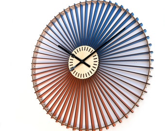 Circular bicolor wall clock with 60 double sided blades - Kinetic orange / blue