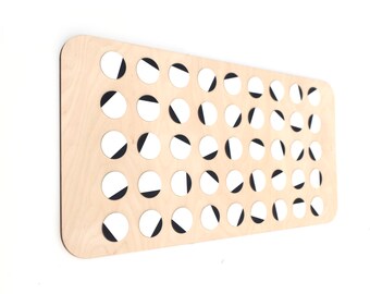 Wooden wall decor with dotted pattern