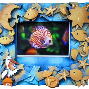 Marco de fotos de cartón para colgar en la pared con forma de océano, 4 x 6. Marco con pez, pulpo, buzo y caballito de mar. Envío GRATIS.