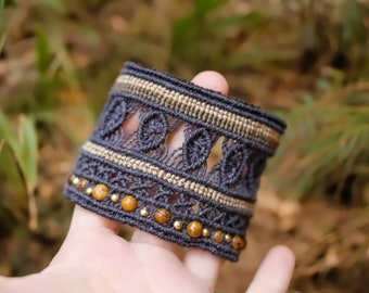 Wide cuff bracelet with numerous jasper beads and brass beads