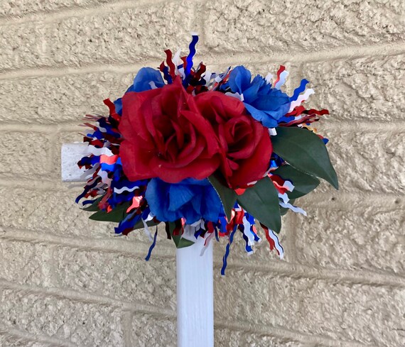 Patriotic Cemetery cross for grave, grave memorial, roadside cross, grave flowers, red-white-blue roses.