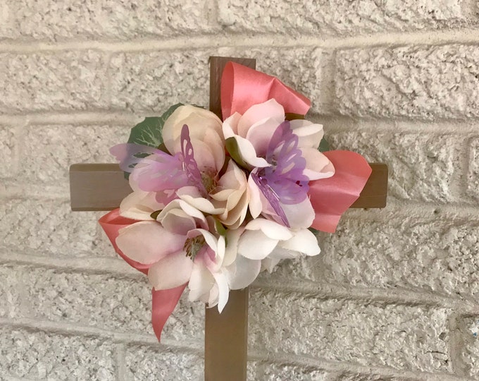 Pink and brown cemetery cross for grave decoration
