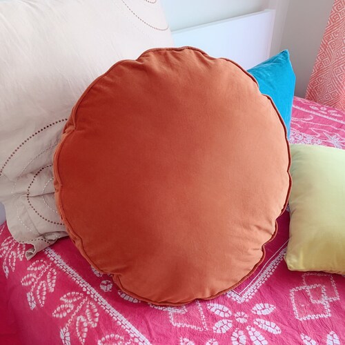 round orange pillow