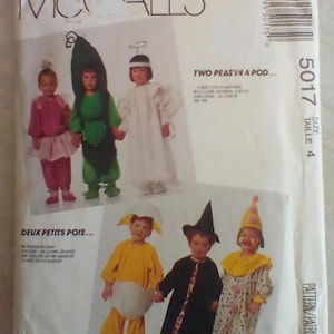 May include: McCall's sewing pattern for children's costumes. The pattern includes instructions for making a pea pod, angel, clown, and witch costumes. The package shows images of children wearing the costumes. The size is 4.