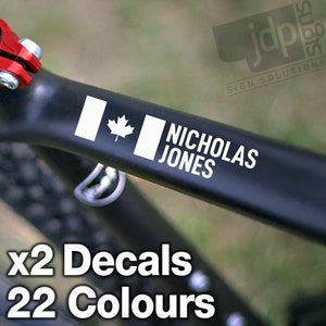 X2 Adhesivos de vinilo personalizados con el nombre del cuadro de la bicicleta y la bandera de Canadá para casco de bicicleta (22 colores disponibles)