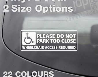 May include: White vinyl decal with a wheelchair symbol and the text "PLEASE DO NOT PARK TOO CLOSE WHEELCHAIR ACCESS REQUIRED". The decal is available in 22 colors and two sizes.