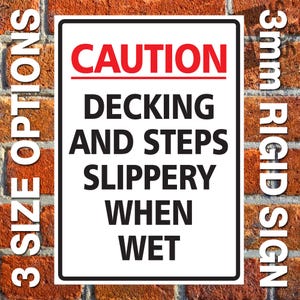 May include: White sign with black text and red lettering that reads "CAUTION DECKING AND STEPS SLIPPERY WHEN WET". The sign is 3mm thick and is made of rigid material.