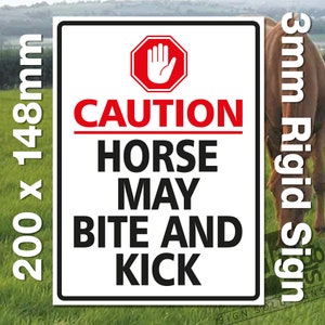 May include: A white sign with red and black text that reads "CAUTION HORSE MAY BITE AND KICK". A red stop sign with a hand print is at the top of the sign. The sign is 200mm x 148mm and is made of 3mm rigid material.