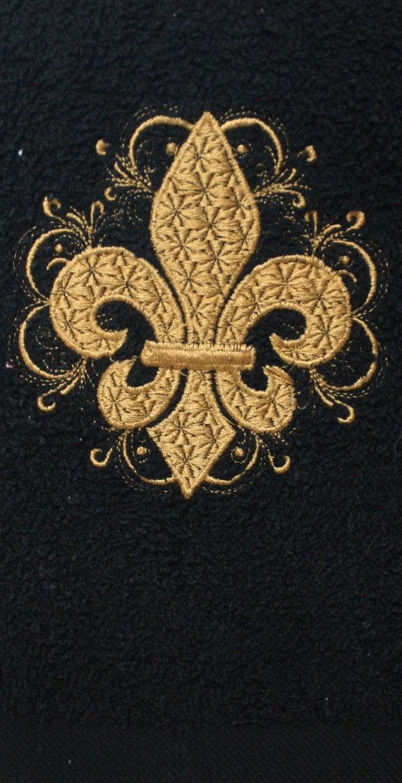Embroidered kitchen or bathroom hand towel.  Fleur de lis with a wonderfully swirled outline.