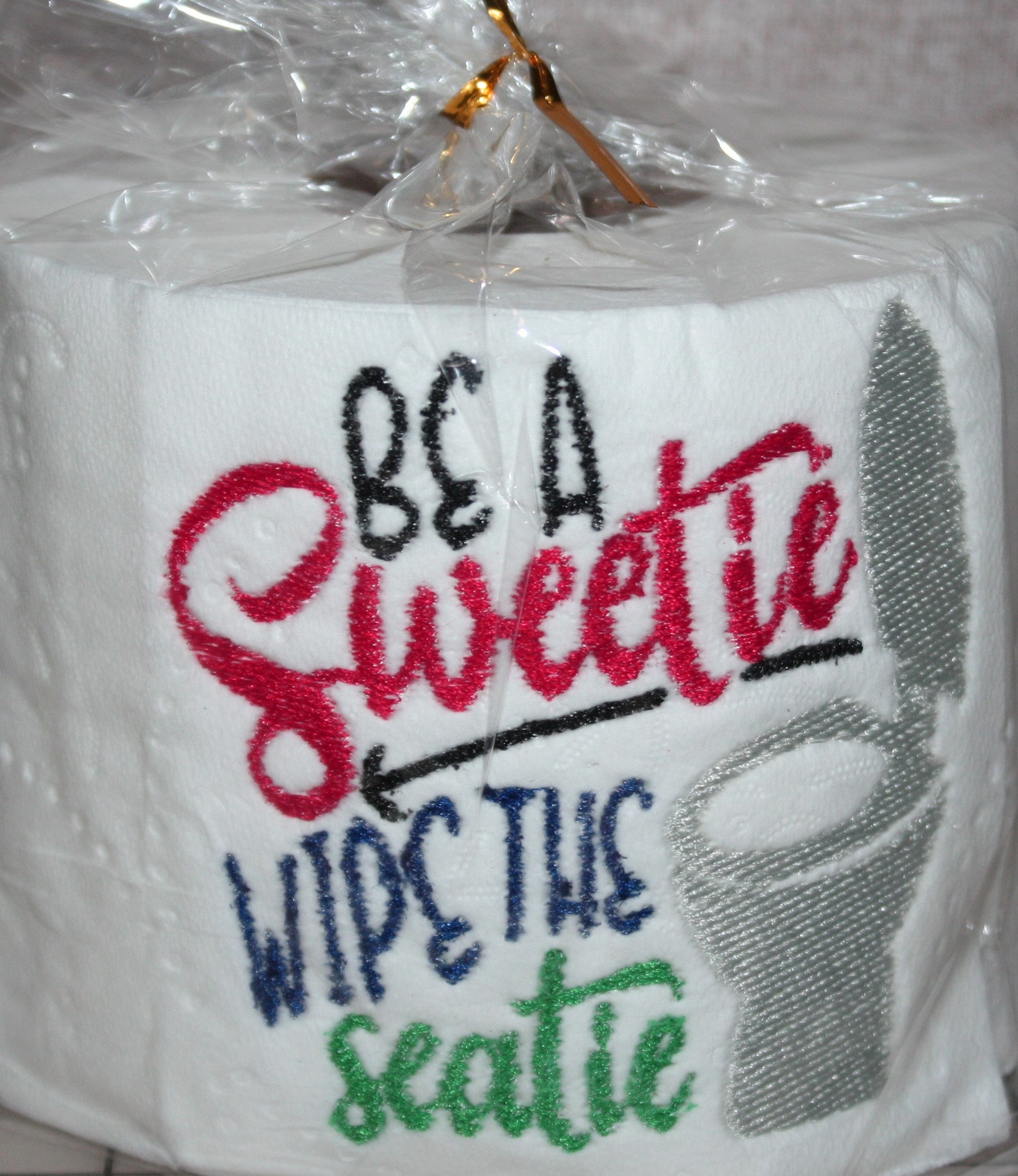 Embroidered Toilet paper with humorous sayings. Etsy