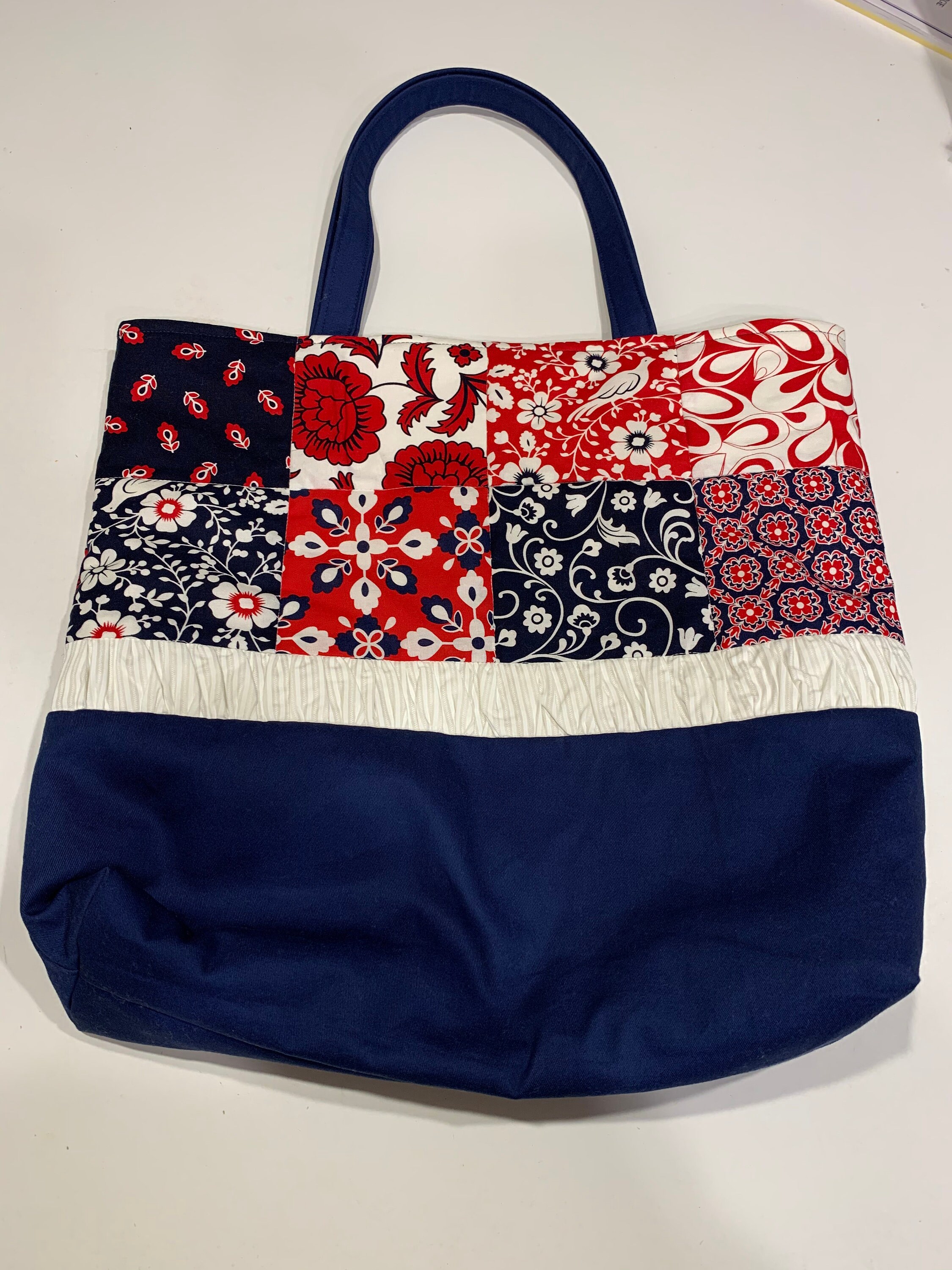 red and blue handbag