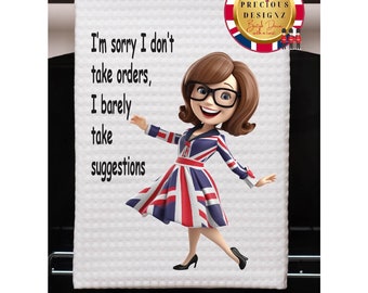 May include: White kitchen towel with a cartoon image of a woman wearing a dress with the Union Jack flag pattern. The text on the towel reads "I'm sorry I don't take orders, I barely take suggestions."
