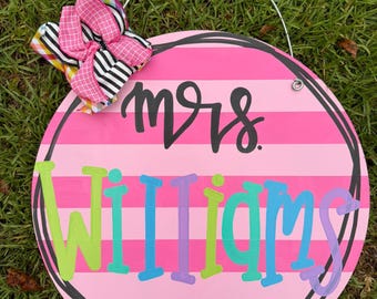 Pink strips colorful cursive print teacher back to school door hanger