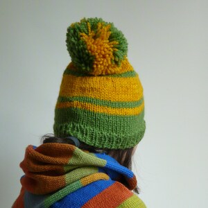 green yellow hat with big pom