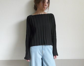 suéter tricotado preto com nervuras