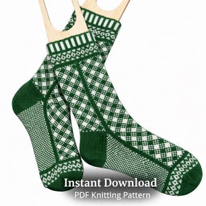 May include: A pair of green and white patterned socks displayed on wooden sock forms. The socks feature a geometric design with a checkered pattern and a contrasting white and green color scheme. The text "Instant Download PDF Knitting Pattern" is visible.