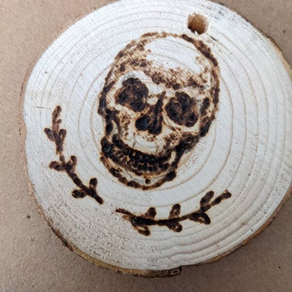 Skull/oak leaf wood ornament