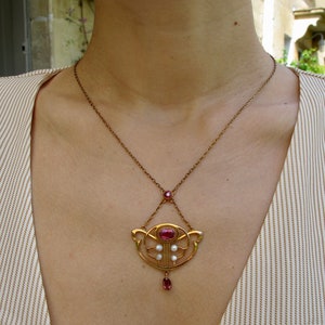 Divine Arts and Crafts nine carat gold rubellite and seed pearl pendant Barnet Henry Joseph c1900
