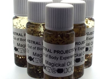 May include: Six small glass bottles with white lids filled with a clear liquid and small brown flakes. The bottles have white labels with black text that reads "Astral Projection Out of Body Experience Magickal Oil" and symbols.