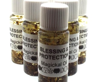 May include: Five small glass bottles with white lids filled with a clear liquid and herbs. The bottles have white labels with the text "Blessing & Protection Magickal Oil".