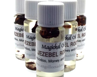 May include: Five small glass bottles with white caps filled with a clear liquid and brown herbs. The bottles have white labels with the text "Magickal Oil Jezebel Root Hoodoo, Money and Love www.angelleesadesigns.com"