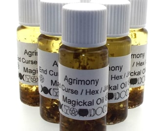 May include: Six small glass bottles with white caps filled with a clear liquid and herbs. The labels on the bottles read "Agrimony", "End Curse", "Magickal Oil", "Hex/Jinkal Oil", and "Agrimony/Hex/Jinkal Oil".