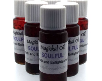 May include: Six small glass bottles with white lids filled with a dark red liquid. Each bottle has a white label with the text "Magickal Oil SOULFUL Growth and Enlightenment angelleesadesigns".