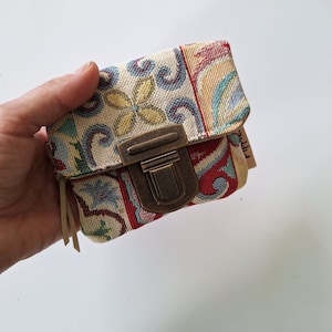 Lovely mini wallet made of upholstery fabric with Moroccan tile motif.  Compact design, easily fits in your pocket, small bag. Perfect gift