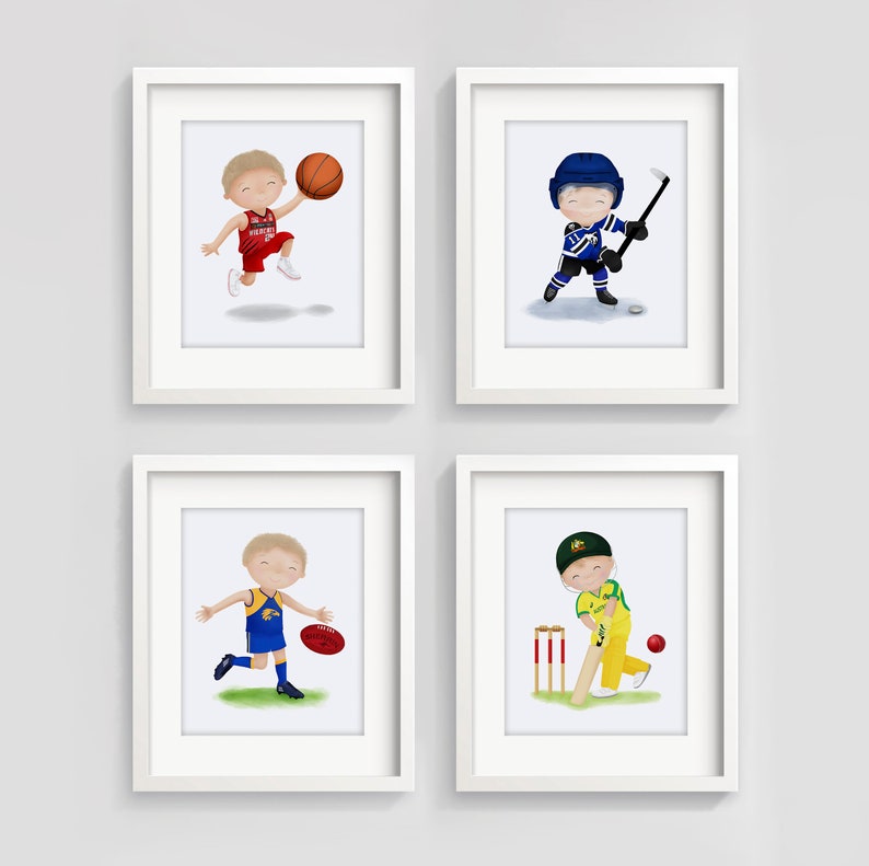 May include: Four framed illustrations of children playing different sports. The top left image shows a child in a red basketball uniform holding a basketball. The top right image shows a child in a blue hockey uniform holding a hockey stick. The bottom left image shows a child in a blue and yellow Australian rules football uniform holding a football. The bottom right image shows a child in a yellow cricket uniform holding a cricket bat.