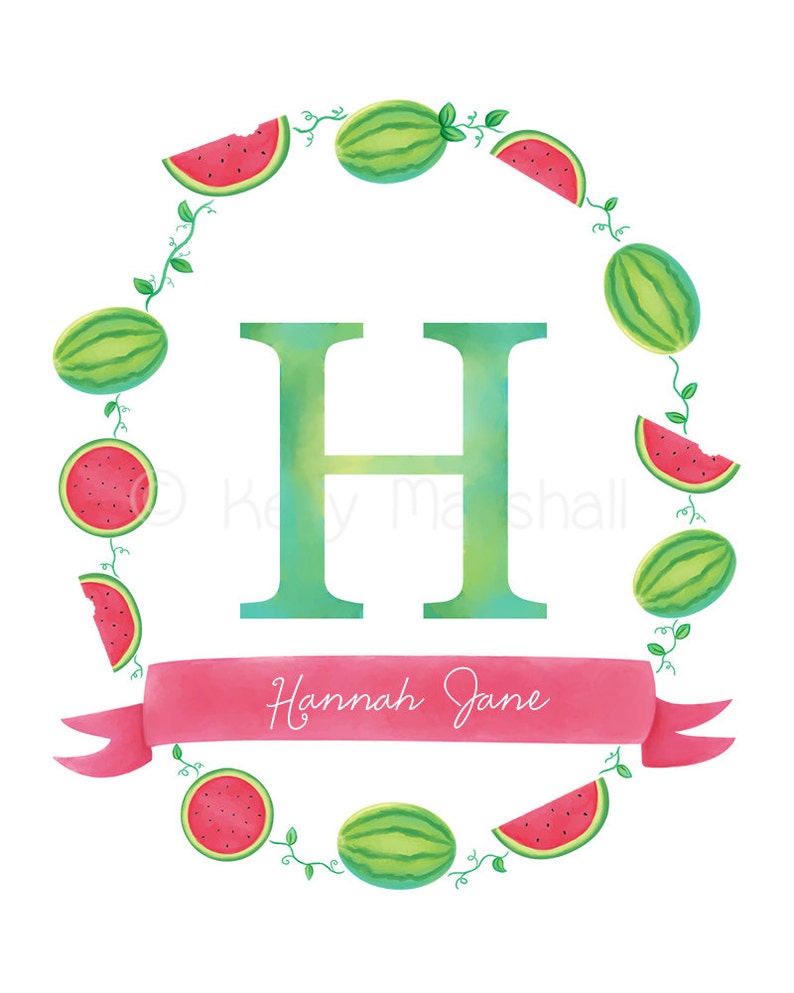 May include: A green letter H with a watercolor effect surrounded by a wreath of watermelon slices and vines. The wreath is pink and green. A pink ribbon with the text "Hannah Jane" is below the letter.