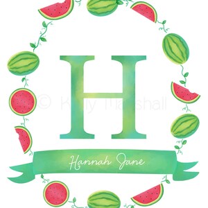 May include: Watermelon wreath with the letter H in the center and the name "Hannah Jane" written on a green ribbon.
