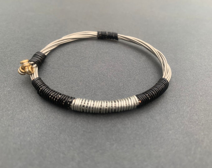 Recycled Electric Guitar String Bracelet, styled with silver and black copper wire. Unisex Unique Guitarist Gift