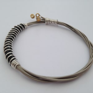 Recycled Guitar String Bracelet, styled with silver plated copper wire. Unisex Unique Guitarist Gift Three Strings