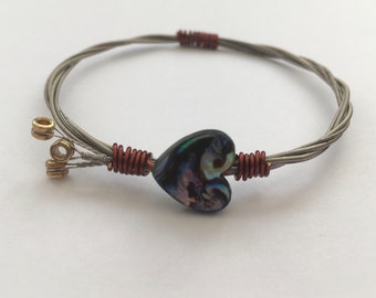 Recycled Guitar String Bangle, styled with an abalone shell heart bead & plated copper wire. Unique Guitarist Gift