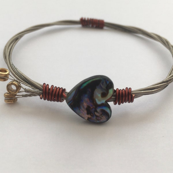 Recycled Guitar String Bangle, styled with an abalone shell heart bead & plated copper wire. Unique Guitarist Gift