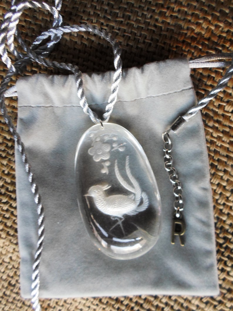 Peacock and flower Chinese carved crystal pendant