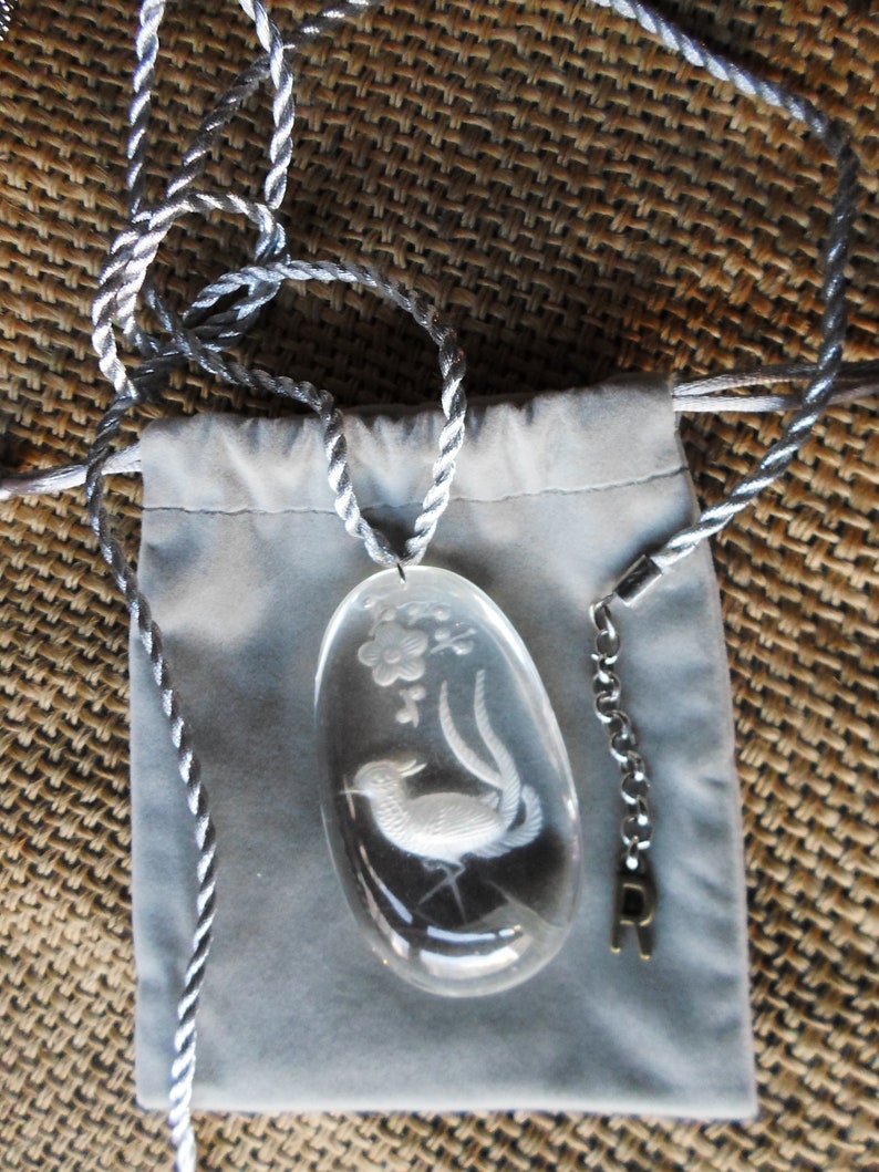 Peacock and flower Chinese carved crystal pendant