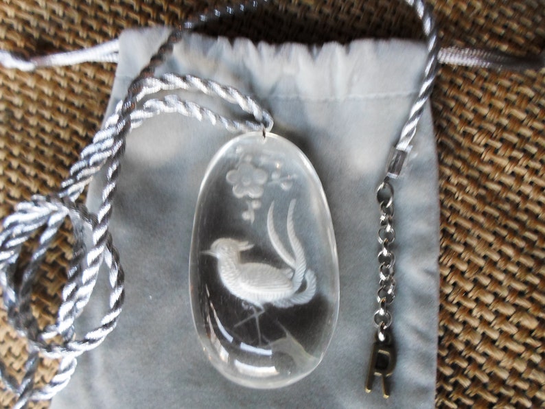 Peacock and flower Chinese carved crystal pendant