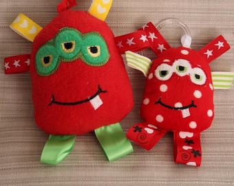 Red Monster is a Soft Sensory Toy for Babies and made in the Embroidery Hoop