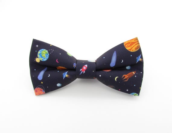 Ribbon: Space Rockets - Antique White 16mm (per metre) Ribbon: Space Rockets - Antique White 16mm (per metre)