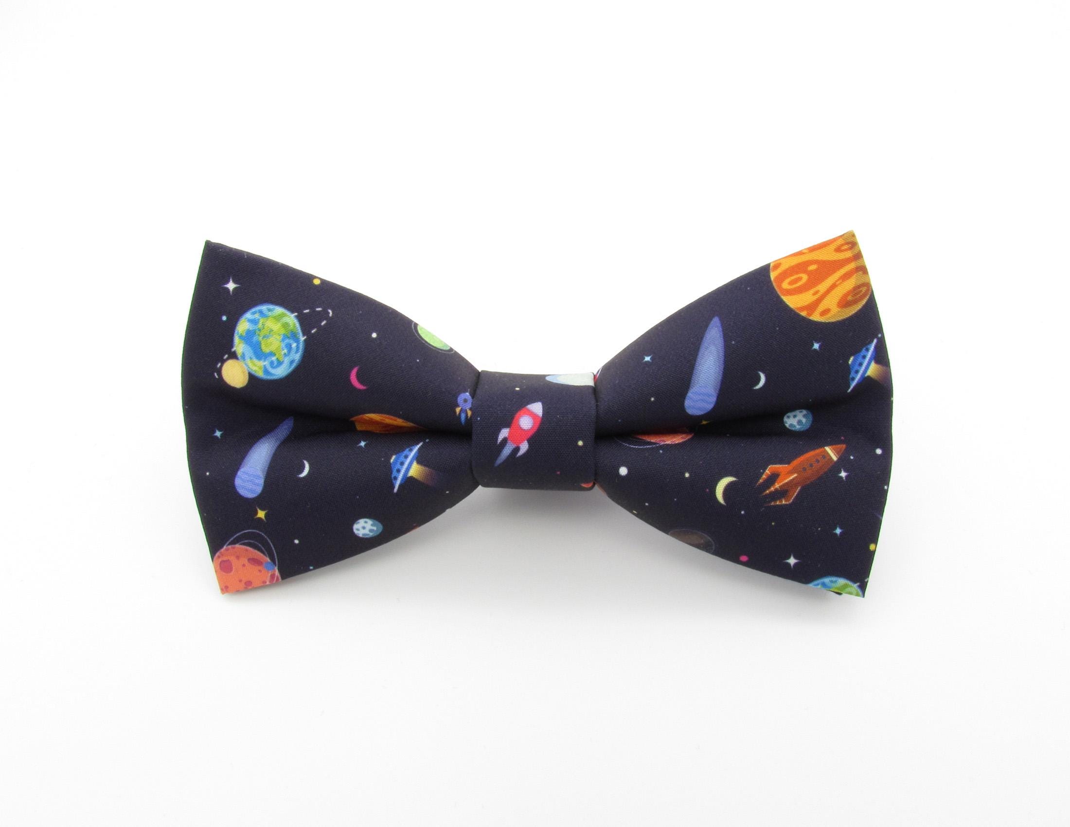 Ribbon: Space Rockets - Antique White 16mm (per metre) Ribbon: Space Rockets - Antique White 16mm (per metre)