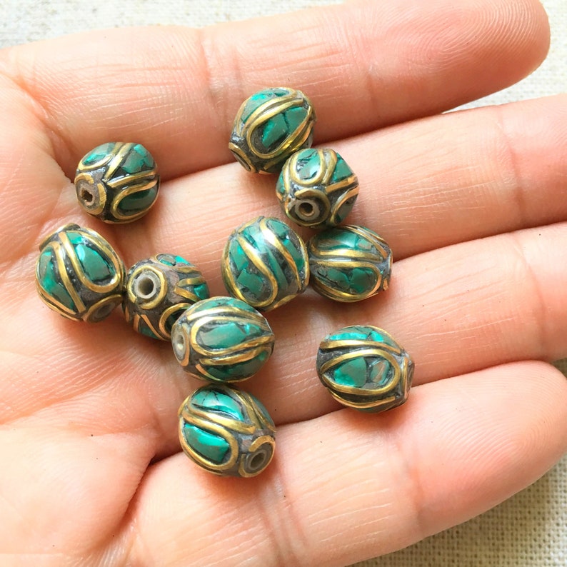 10 handmade Tibetan prayer beads nepal brass beads with turquoise inlay 10 handmade Tibetan prayer beads nepal brass beads with turquoise inlay
