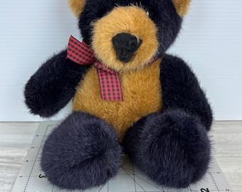 Osito de peluche Dakin vintage de 1994, negro y marrón, con lazo de cuadros.