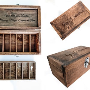 May include: Wooden keepsake box with a dark stain, featuring a hinged lid and a latch with a key. The lid is engraved with "Jay's Collection." The inside of the box has dividers. The open lid reveals the inscription "We love you, Dada! Mommy, Maya, Sophia, & Liam."